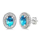 Load image into Gallery viewer, 6X4 MM Oval Shape Blue Topaz and 1/50 Ctw Round Cut Diamond Semi-Precious Earrings in Sterling Silver