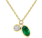 Load image into Gallery viewer, 5x3 MM Oval Cut Emerald and 1/50 Ctw Bezel Set Round Cut Diamond Precious Pendant With Chain in 10K Yellow Gold
