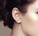 Load image into Gallery viewer, 1/5 Ctw Petite Bezel Set Emerald Cut Diamond Fashion Stud Earring in 10K Yellow Gold