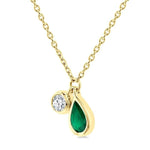 Load image into Gallery viewer, 5x3 MM Pear Cut Emerald and 1/50 Ctw Bezel Set Round Cut Diamond Precious Pendant With Chain in 10K Yellow Gold