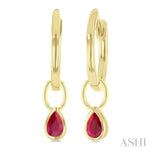 Load image into Gallery viewer, 5x3 MM Bezel Set Pear Cut Ruby Precious Fashion Huggie Earrings in 10K Yellow Gold