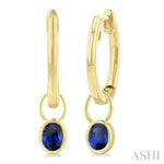 Load image into Gallery viewer, 5x3 MM Bezel Set Oval Cut Sapphire Precious Fashion Huggie Earrings in 10K Yellow Gold