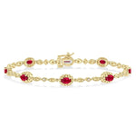 Load image into Gallery viewer, 5x3 MM Oval Cut Ruby and 1/20 Ctw Round Cut Diamond Bracelet in 10K Yellow Gold