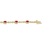 Load image into Gallery viewer, 5x3 MM Oval Cut Ruby and 1/20 Ctw Round Cut Diamond Bracelet in 10K Yellow Gold