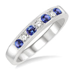 Load image into Gallery viewer, 2.5 MM Round Cut Tanzanite and 1/5 Ctw Channel Set Round Cut Diamond Band in 14K White Gold
