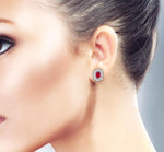 Load image into Gallery viewer, 5x3 MM Oval Cut Ruby and 1/10 Ctw Round Cut Diamond Earrings in 14K White Gold