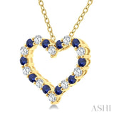 1.4 MM Round Cut Sapphire and 1/8 Ctw Open Heart Round Cut Diamond Precious Fashion Pendant With Chain in 14K Yellow Gold