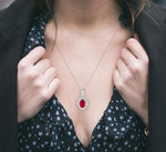 Load image into Gallery viewer, 6x4 MM Oval Cut Ruby and 1/8 Ctw Round Cut Diamond Center Sunflower Precious Pendant in 10K White Gold with chain