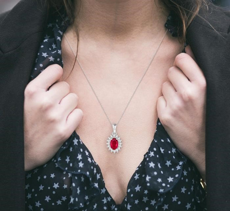 6x4 MM Oval Cut Ruby and 1/8 Ctw Round Cut Diamond Center Sunflower Precious Pendant in 10K White Gold with chain