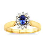 Load image into Gallery viewer, 5x3mm Oval Cut Tanzanite and 1/10 Ctw Round Cut Diamond Ring in 10K Yellow Gold