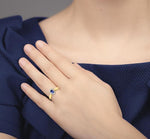 Load image into Gallery viewer, 5x3mm Oval Cut Tanzanite and 1/10 Ctw Round Cut Diamond Ring in 10K Yellow Gold