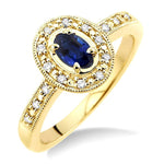 Load image into Gallery viewer, 5x3 MM oval cut Sapphire and 1/10 Ctw Round Cut Diamond Ring in 14K Yellow Gold.
