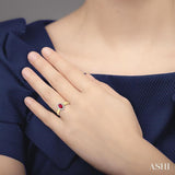 6x4MM Oval Cut Ruby and 1/5 Ctw Round Cut Diamond Ring in 14K Yellow Gold