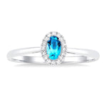 Load image into Gallery viewer, 5x3 MM Oval Shape Blue Topaz and 1/20 Ctw Round Cut Diamond Halo Semi-Precious Ring in 14K White Gold