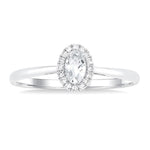 Load image into Gallery viewer, 5x3 MM Oval Shape White Topaz and 1/20 Ctw Round Cut Diamond Halo Semi-Precious Ring in 14K White Gold