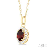 5x3 MM Oval Shape Garnet and 1/20 Ctw Round Cut Diamond Halo Semi-Precious Pendant with Chain in 14K Yellow Gold