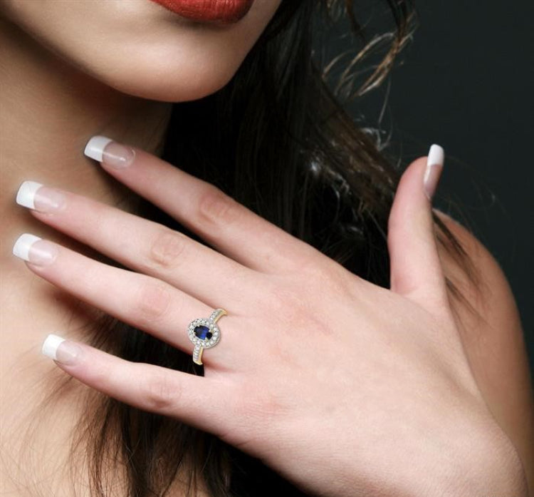 6x4 MM Oval Cut Sapphire and 1/4 Ctw Round Cut Diamond Ring in 14K Yellow Gold