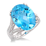 Load image into Gallery viewer, 16x12 MM Oval Cut Blue Topaz and 1/4 Ctw Round Cut Diamond Semi-Precious Ring in 14K White Gold