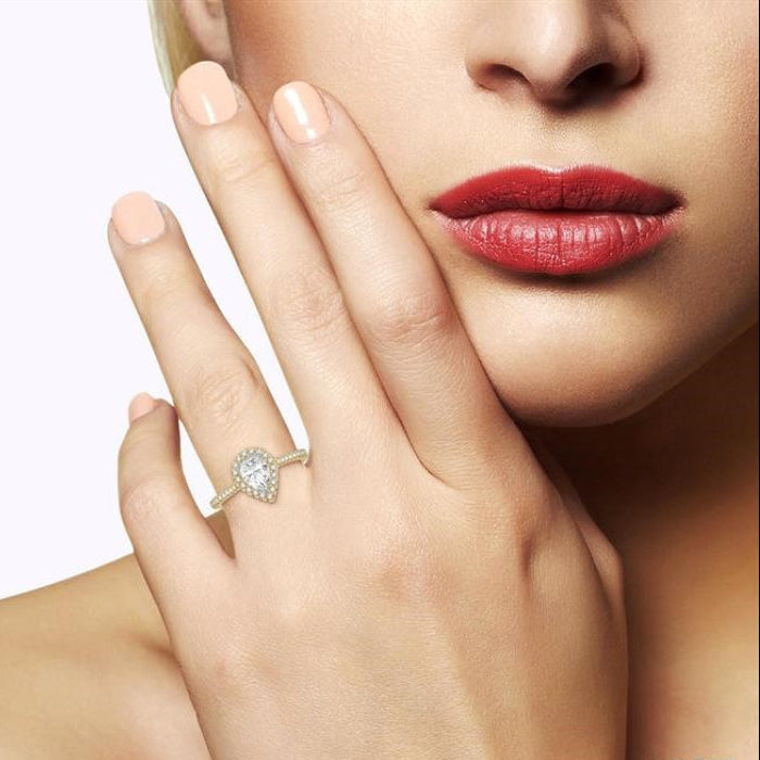 3/8 Ctw Pear Shape Diamond Ladies Engagement Ring with 1/4 Ct Pear Cut Center Stone in 14K Yellow and White Gold