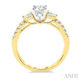 7/8 Ctw Pear and Round Cut Diamond Engagement Ring With 1/2 Ct Round Cut Center Stone in 14K Yellow and White Gold