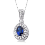 Load image into Gallery viewer, 6x4 MM Oval Cut Sapphire and 1/8 Ctw Round Cut Diamond Pendant in 14K White Gold with Chain