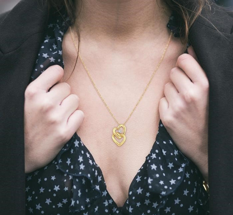 1/20 Ctw Round Cut Diamond Pendant in 10K Yellow Gold with Chain