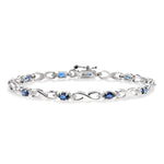 Load image into Gallery viewer, 4x3 MM Oval Cut Sapphire and 1/10 Ctw Round Cut Diamond Bracelet in 10K White Gold