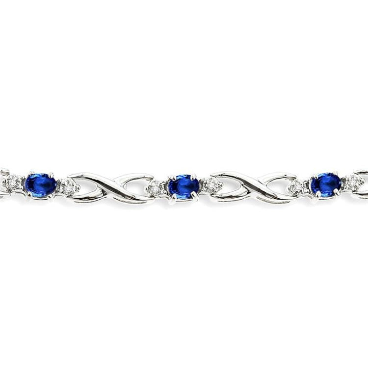 4x3 MM Oval Cut Sapphire and 1/10 Ctw Round Cut Diamond Bracelet in 10K White Gold
