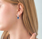 Load image into Gallery viewer, 5x3 MM Oval Cut Sapphire and 1/5 Ctw Round Cut Diamond Earrings in 10K White Gold