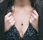 Load image into Gallery viewer, 6x4 MM Oval Cut Sapphire and 1/10 Ctw Round Cut Diamond Pendant in 10K White Gold with Chain