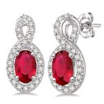 Load image into Gallery viewer, 5x3 MM Oval Cut Ruby and 1/5 Ctw Round Cut Diamond Earrings in 10K White Gold