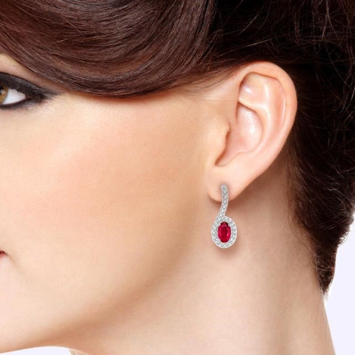 5x3 MM Hanging Arm Oval Cut Ruby and 1/6 Ctw Round Cut Diamond Precious Earring in 10K White Gold