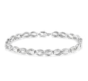 1/20 Ctw Swirl Shape Round Cut Diamond Bracelet in Sterling Silver
