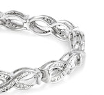 Load image into Gallery viewer, 1/20 Ctw Swirl Shape Round Cut Diamond Bracelet in Sterling Silver