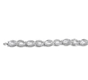 1/20 Ctw Swirl Shape Round Cut Diamond Bracelet in Sterling Silver