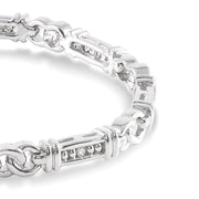 1/10 Ctw Knot Shape Round Cut Diamond Link Bracelet in Sterling Silver