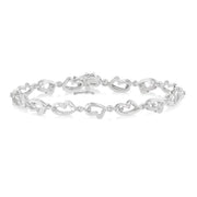 1/20 Ctw Heart Shape Round Cut Diamond Bracelet in Sterling Silver