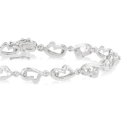 1/20 Ctw Heart Shape Round Cut Diamond Bracelet in Sterling Silver