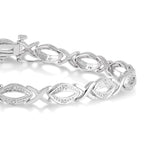 Load image into Gallery viewer, 1/10 Ctw Round Cut Diamond Swirl bracelet in Sterling Silver