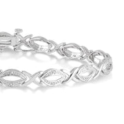 1/10 Ctw Round Cut Diamond Swirl bracelet in Sterling Silver