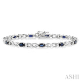 5x3 MM Oval Cut Sapphire and 1/10 Ctw Single Cut Diamond Bracelet in 10K White Gold