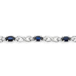 Load image into Gallery viewer, 5x3 MM Oval Cut Sapphire and 1/10 Ctw Round Cut Diamond Bracelet in 10K White Gold