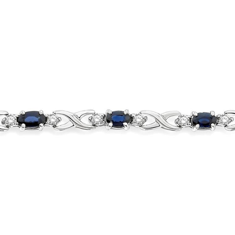 5x3 MM Oval Cut Sapphire and 1/10 Ctw Round Cut Diamond Bracelet in 10K White Gold