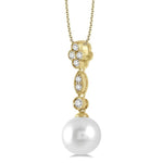 Load image into Gallery viewer, 8 MM Cultured Pearl and 1/6 Ctw Floral Dangler Round Cut Diamond Pendant With Chain in 14K Yellow Gold