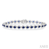 4x3 MM Oval Cut Sapphire and 1 Ctw Round Cut Diamond Precious Bracelet in 14K White Gold