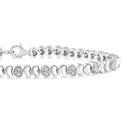1/6 Ctw Puffed Heart Plain and Round Cut Diamond Fashion Bracelet in Sterling Silver