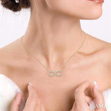 1/2 Ctw Round Cut Diamond Infinity Pendant With Chain in 14K Yellow Gold