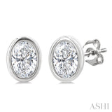1/5 Ctw Petite Bezel Set Oval Cut Diamond Fashion Stud Earring in 10K White Gold