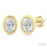 1/5 Ctw Petite Bezel Set Oval Cut Diamond Fashion Stud Earring in 10K Yellow Gold