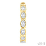 1 1/10 Ctw Bezel Set Oval Cut Diamond Fashion Hoop Earring in 14K Yellow Gold